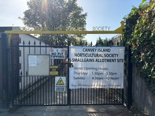The Canvey Island Horticultural Society entrance at Smallgains Allotment site with opening times